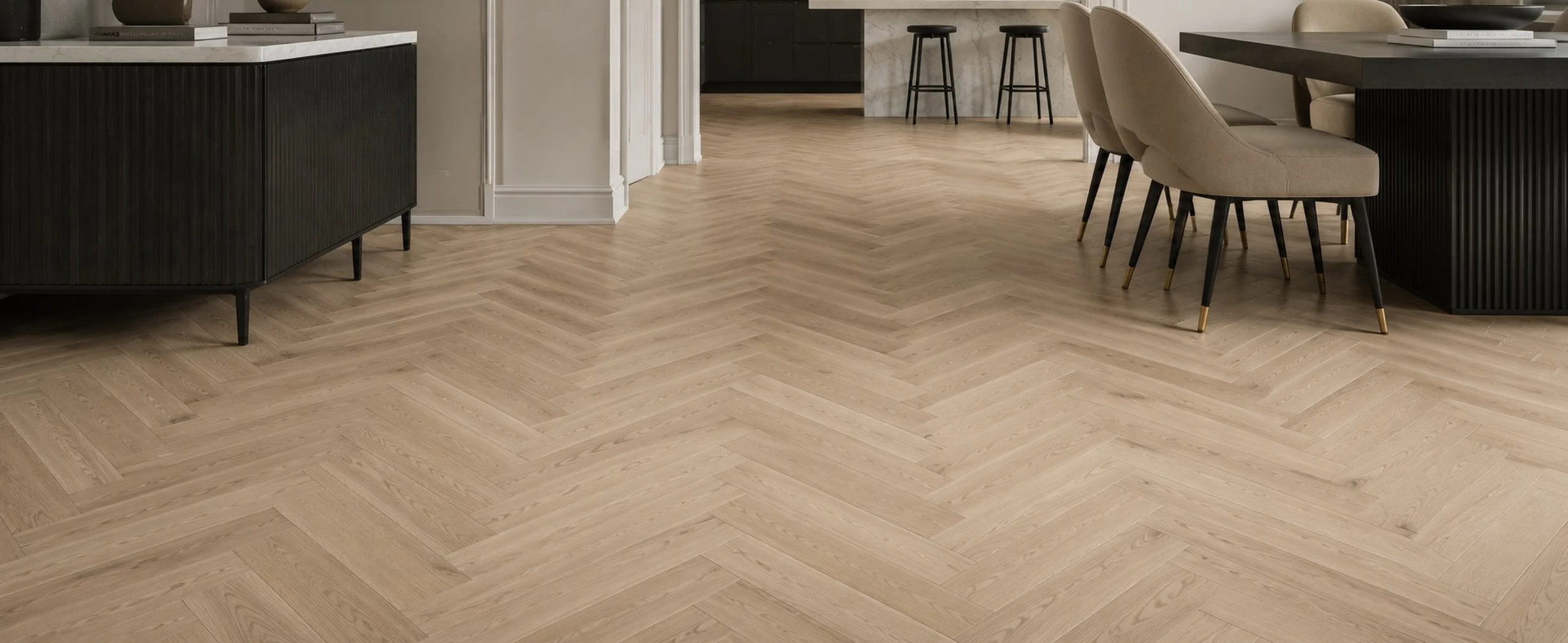 Engineered oak chevron flooring in a dark contemporary London kitchen