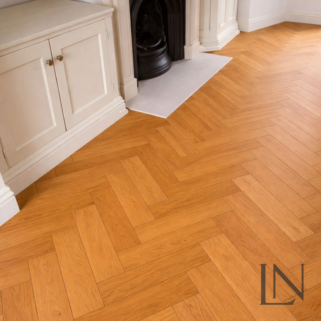 American oak mellow herringbone flooring installed in a room
