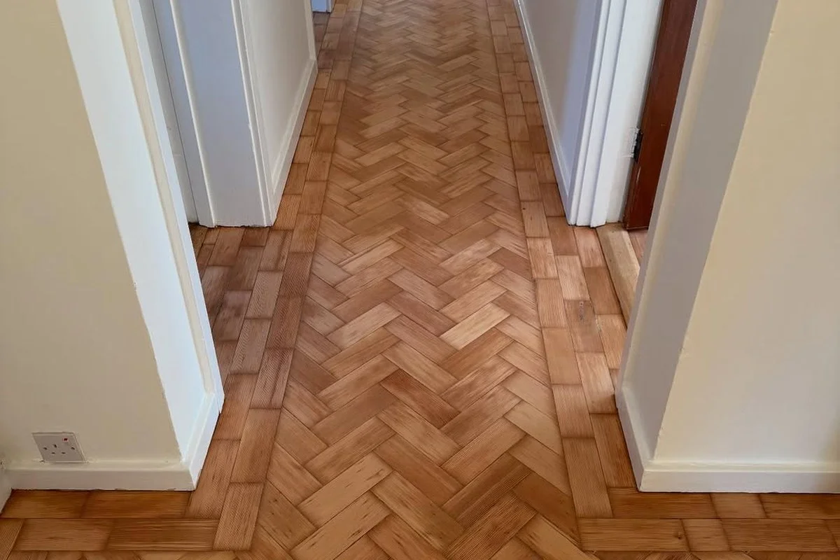 Restored oak parquet hallway after sanding and sealing